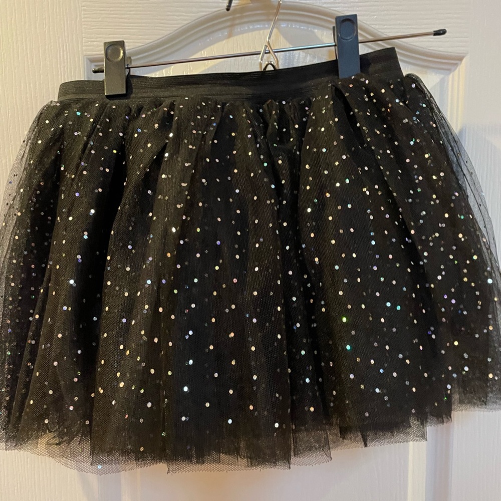 Claire’s back tutu with colored sparkles size M/L